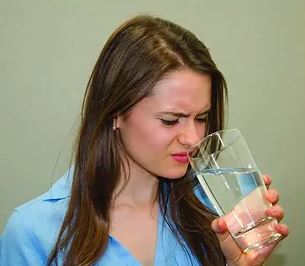 women smelling bad water